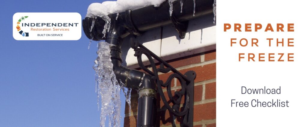 This image shows a frozen exterior drain pipe and gutters - Independent Restoration Services - Built On Service